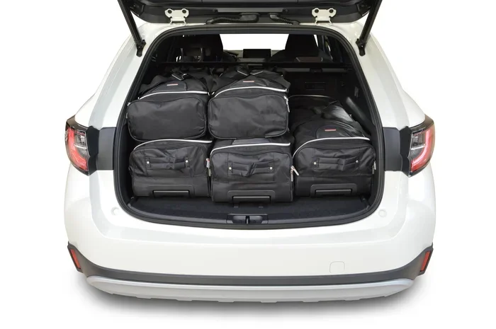 How Many Large Suitcases Fit In A Toyota Corolla Trunk
